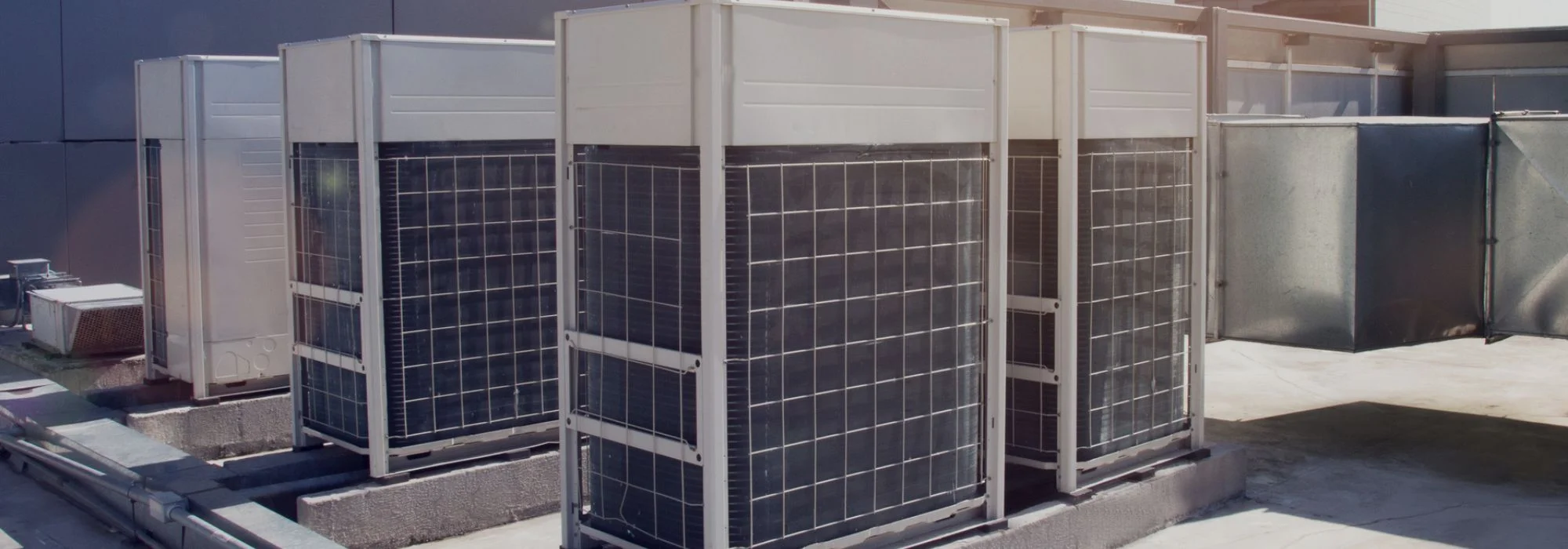 Large VRF HVAC units on cement blocks